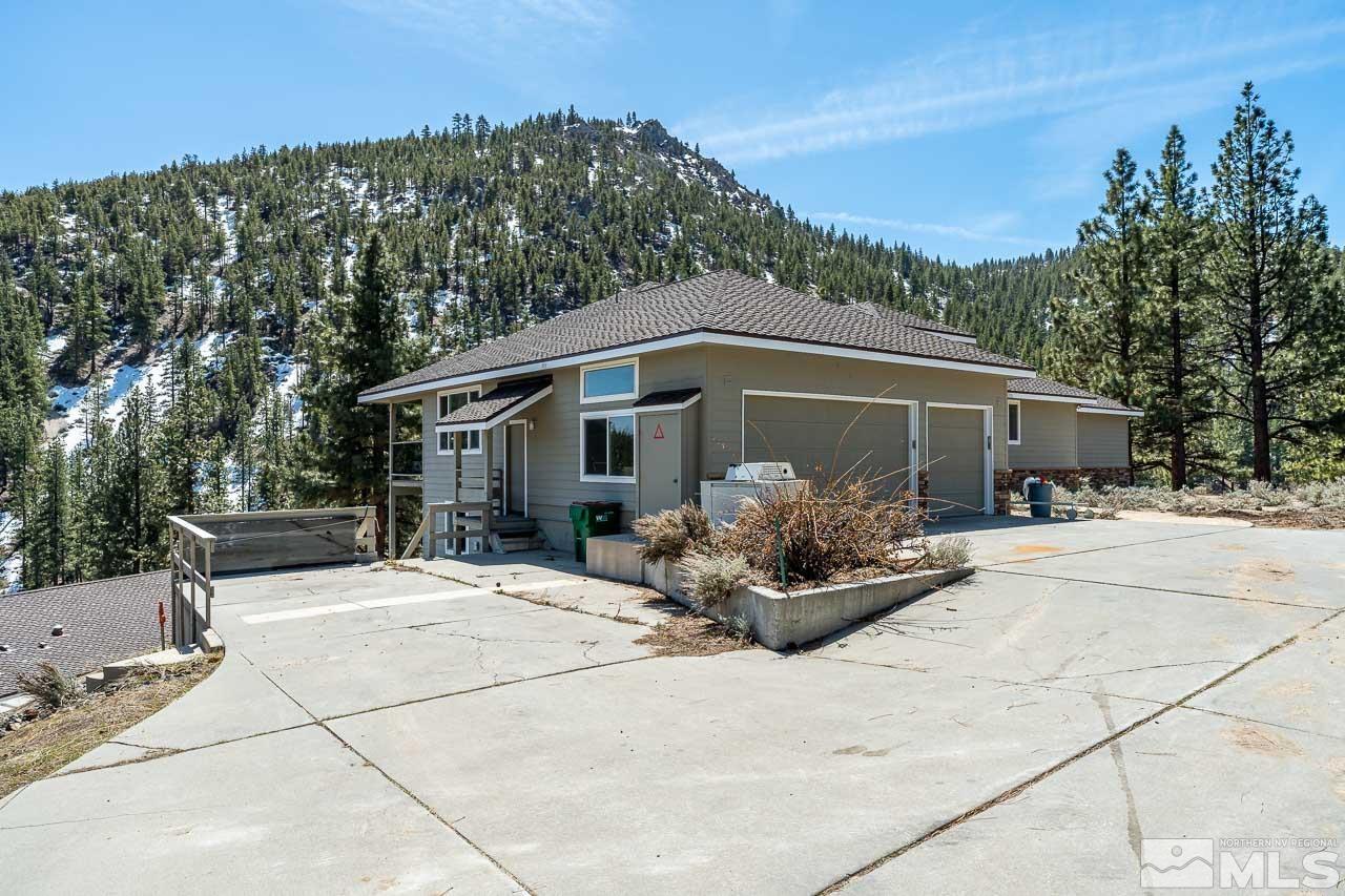4670 Old Clear Creek Road Carson City, NV 89705 - Photo 7 of 8 a front view of house with yard outdoor seating and entertaining space
