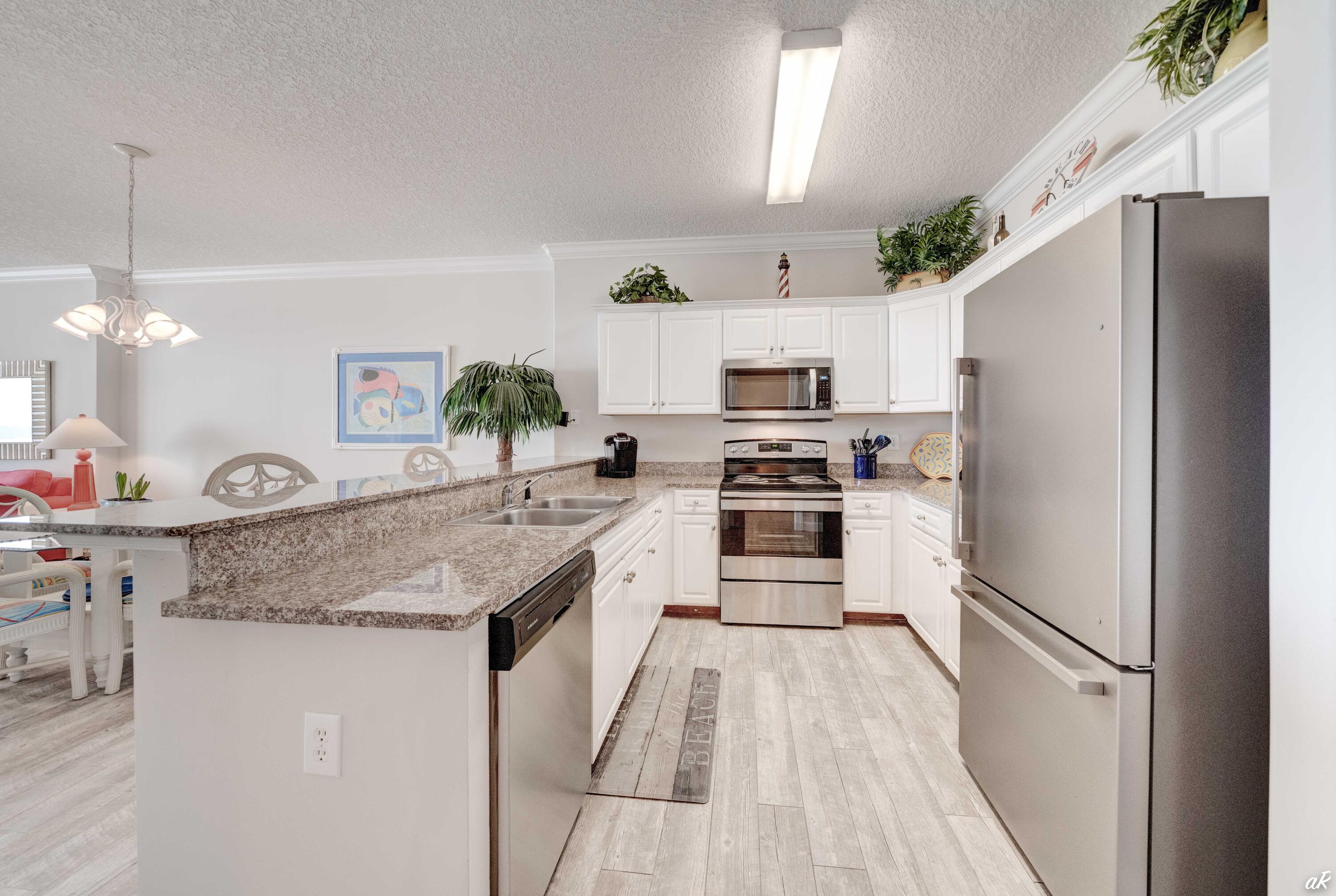 17545 Front Beach Road, Unit 606 Panama City Beach, FL 32413 - Photo 3 of 42 Kitchen-2