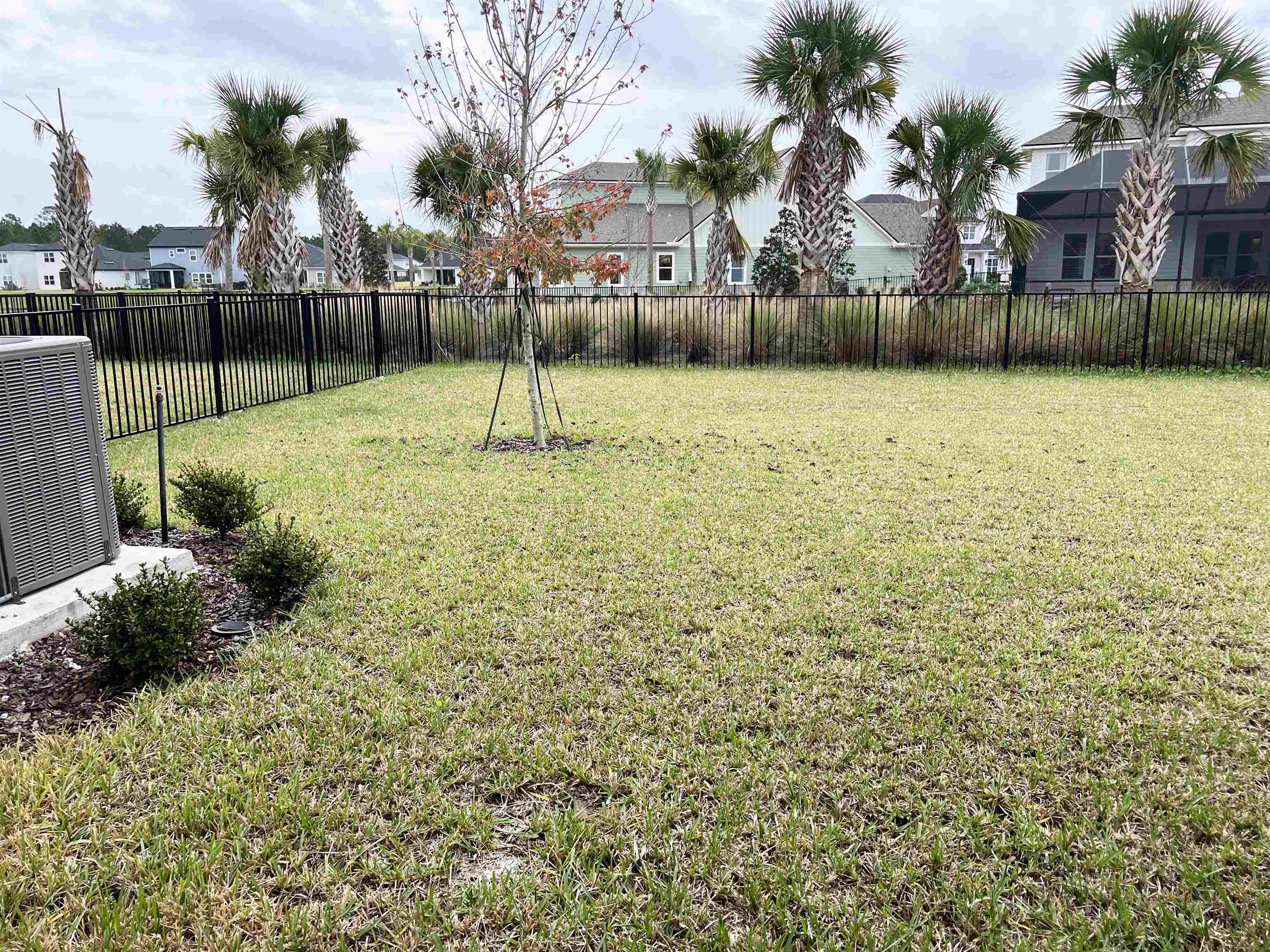 385 Brookgreen Way St. Augustine, FL 32092 - Photo 28 of 31 a view of a swimming pool and a bench