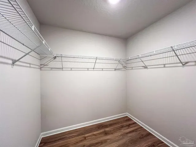 a view of a room with racks on the wall