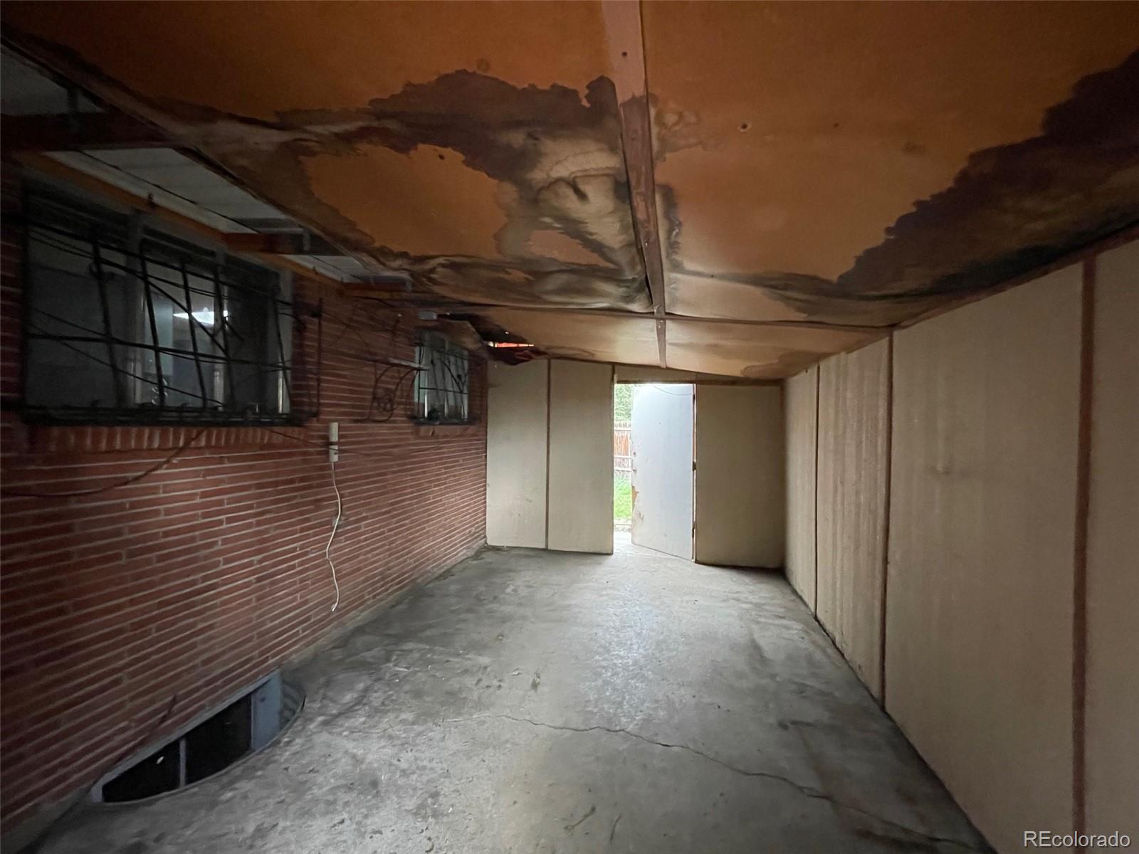 7190 Beach Street Westminster, CO 80030 - Photo 12 of 19 a view of empty room with wooden floor