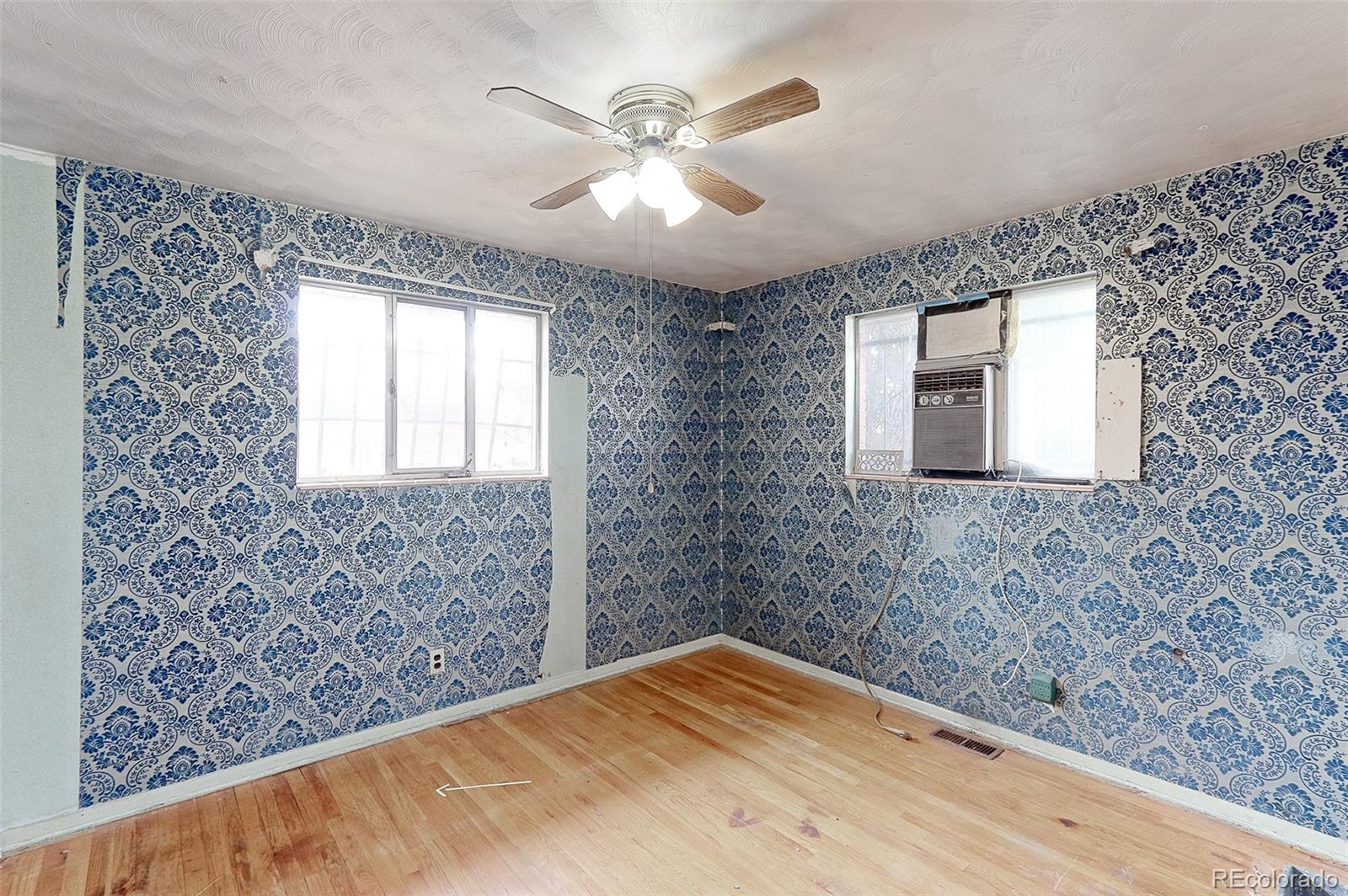 7190 Beach Street Westminster, CO 80030 - Photo 9 of 19 a bathroom with a bathtub and a shower