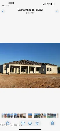 a view of a big room with wooden wall