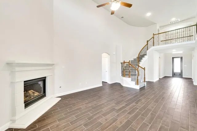 a view of kitchen with sink and wooden floor