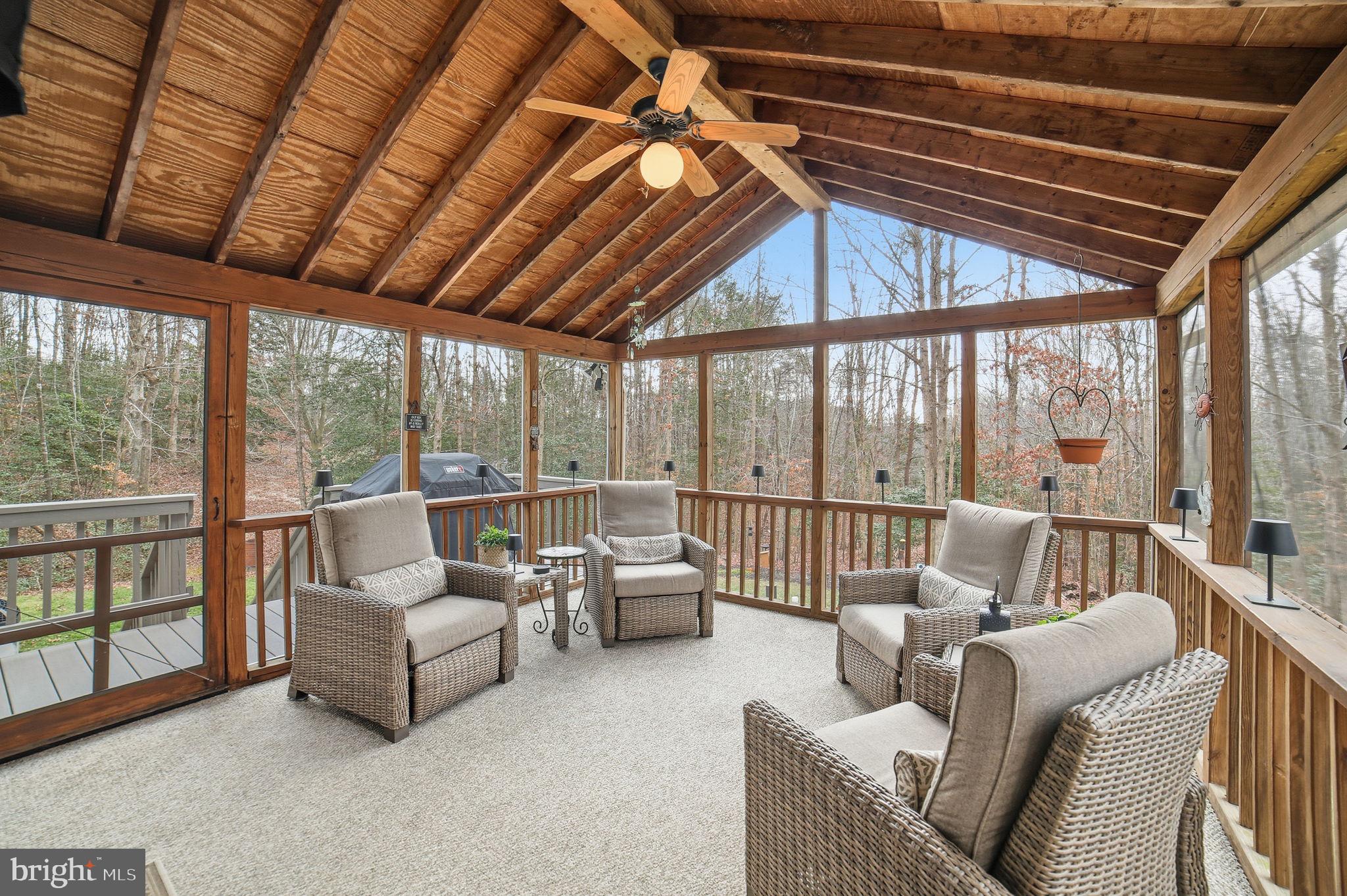 7730 Riparian Court Fredericksburg, VA 22408 - Photo 19 of 24 a living room with furniture and a large window