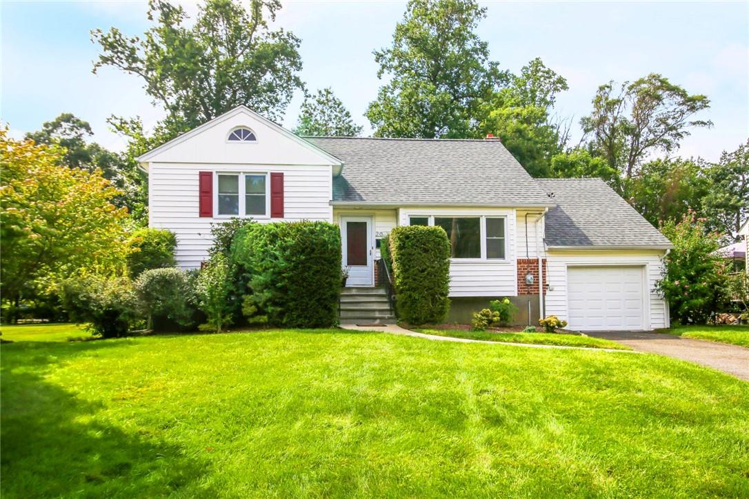 20 Primrose Road Scarsdale, NY 10583 - Photo 1 of 1 a front view of a house with yard and green space