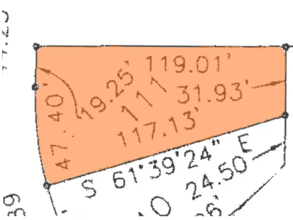 a close up of a wall with a sign on it