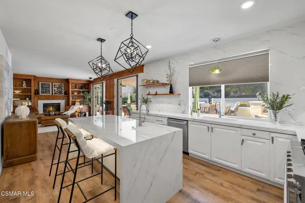 a very nice looking dining room with a table and chairs