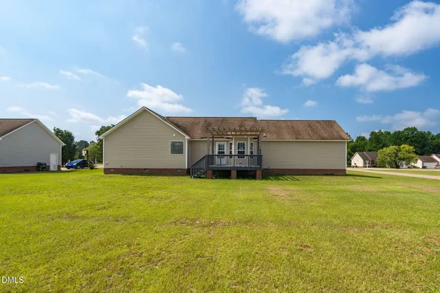 a house view with a garden space
