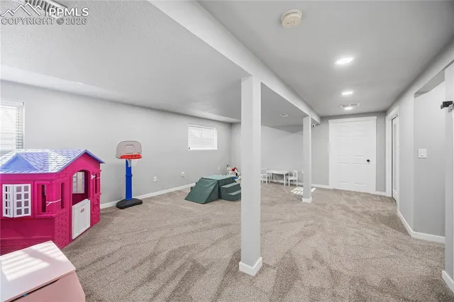 a view of workspace with wooden floor