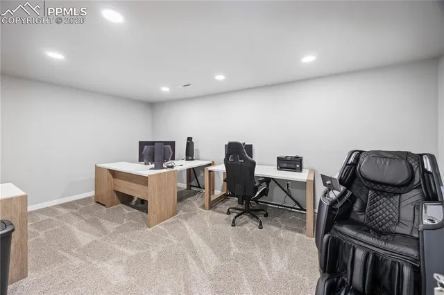 a room with furniture and a flat screen tv