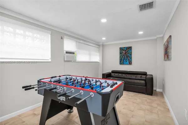 a bedroom with a bed and furniture