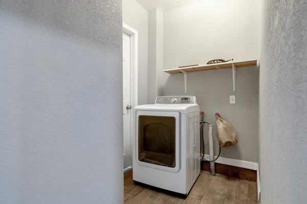 a view of a house with backyard