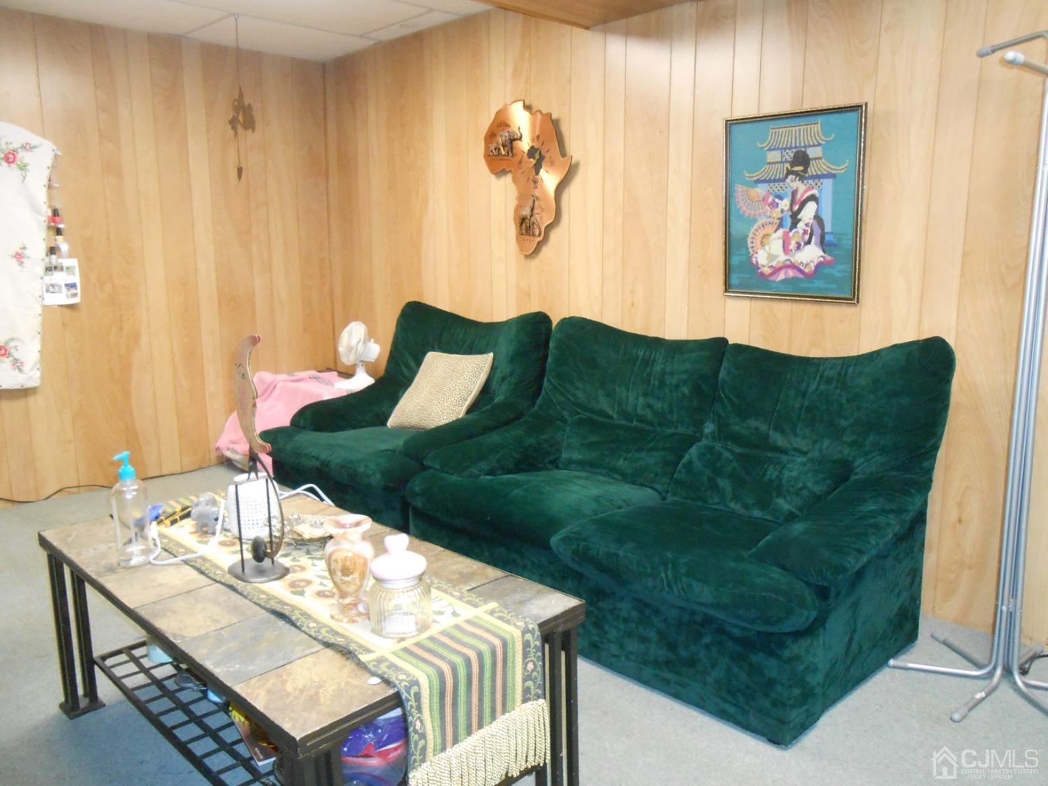 93 Pheasant Run Edison, NJ 08820 - Photo 19 of 24 a view of a dining room with furniture and wooden floor