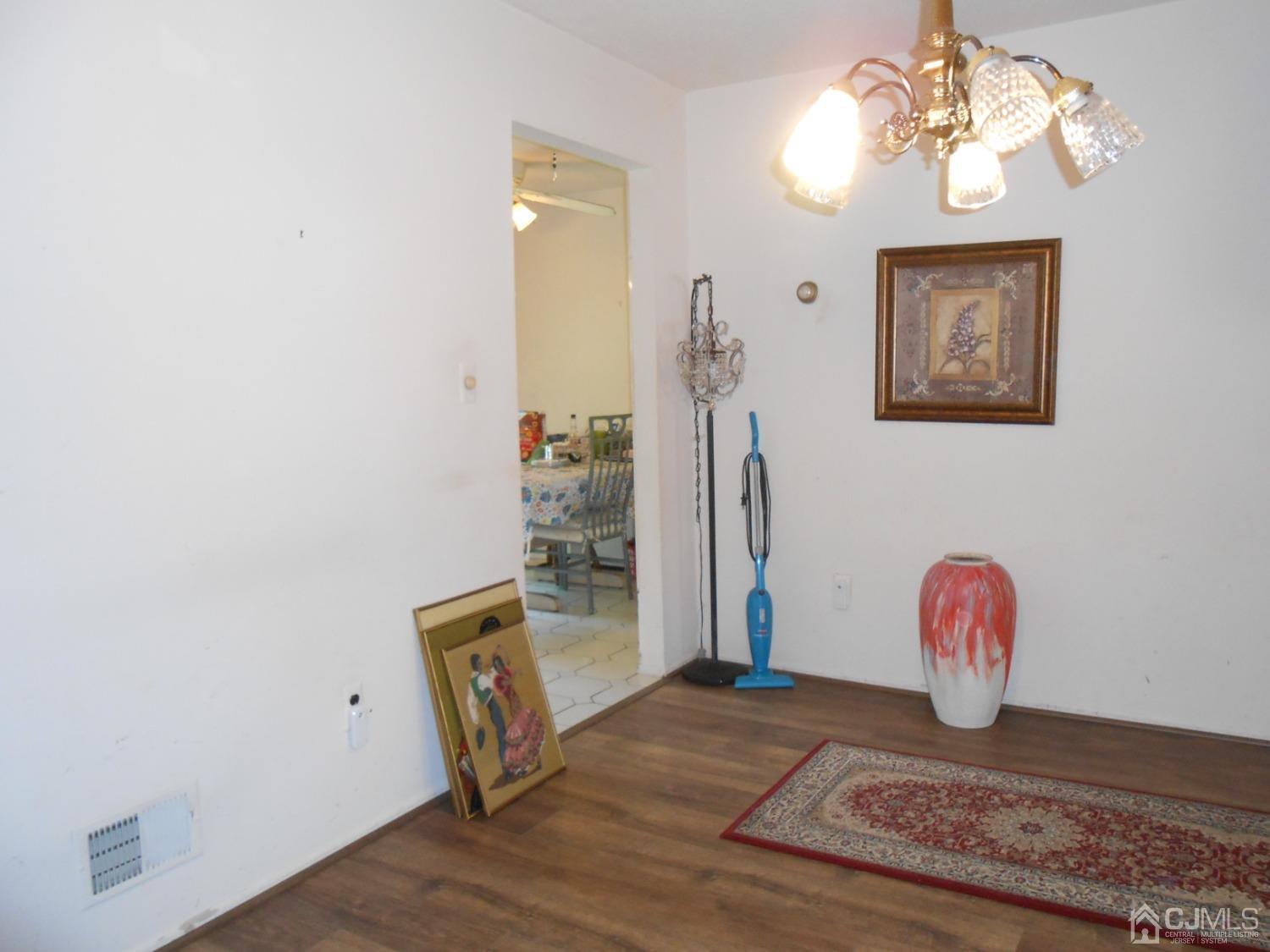 93 Pheasant Run Edison, NJ 08820 - Photo 5 of 24 a view of a hallway with front door