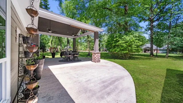 a view of a dining room with furniture and windows