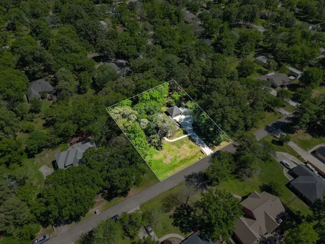 a front view of house with yard and outdoor seating