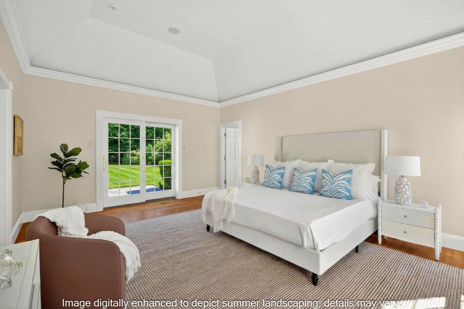 44 Seapuit Road Osterville, MA 02655 - Photo 17 of 33 a bedroom with a bed a couch and a potted plant