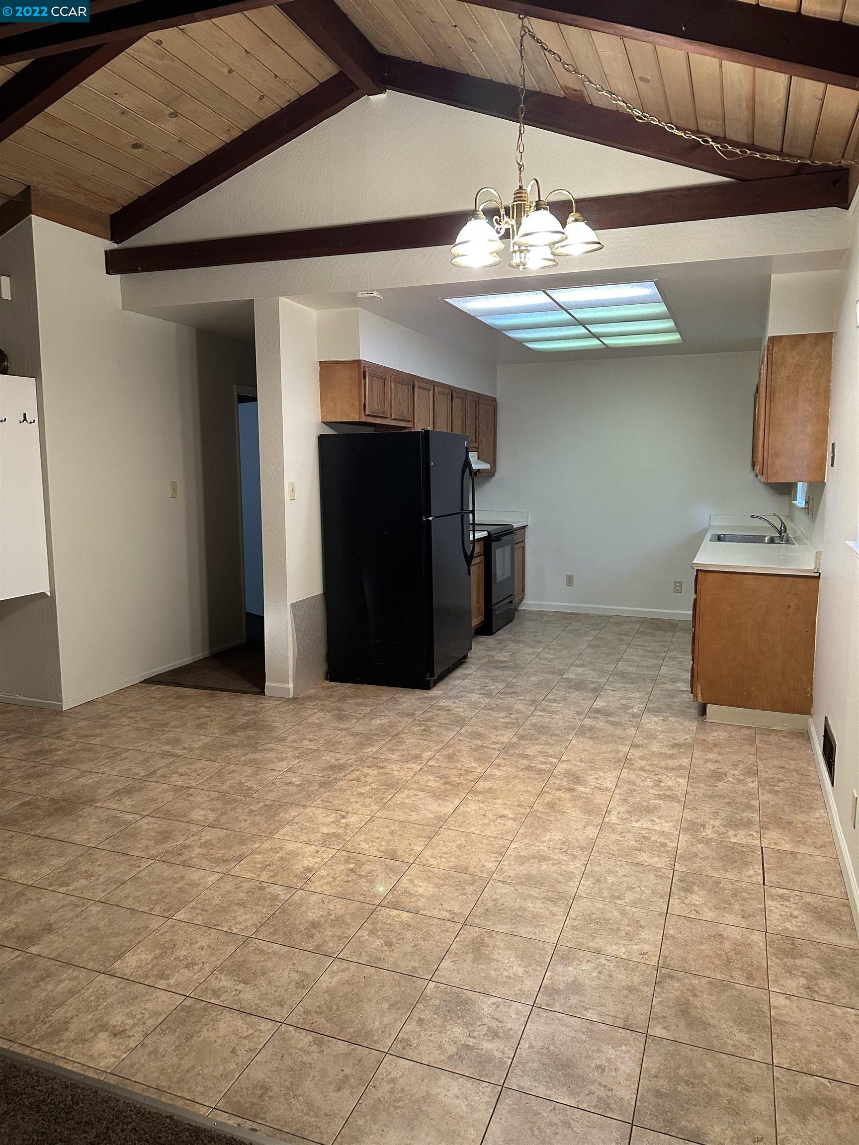 2715 Cowell Road Concord, CA 94518 - Photo 4 of 5 a view of a livingroom with a chandelier