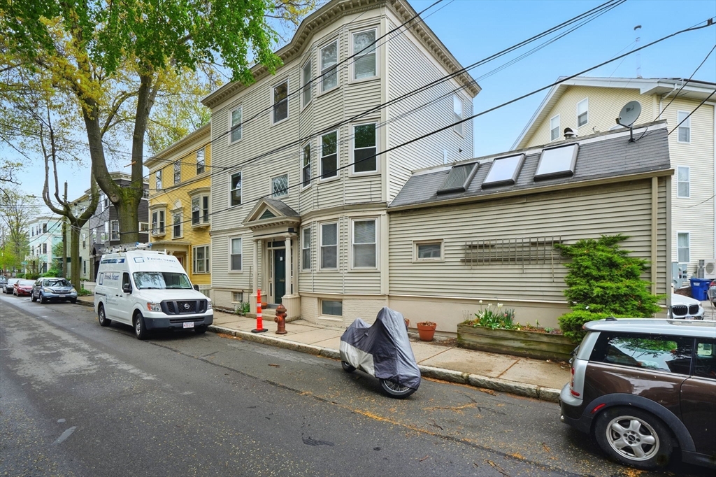 65 Eustis Street, Unit 2 Cambridge, MA 02140 - Photo 11 of 11 a car parked in front of a house