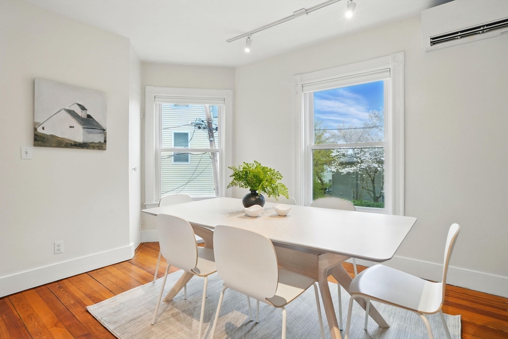 65 Eustis Street, Unit 2 Cambridge, MA 02140 - Photo 4 of 11 a dining room with furniture and wooden floor