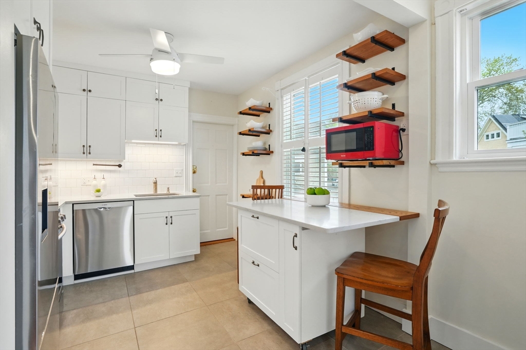 65 Eustis Street, Unit 2 Cambridge, MA 02140 - Photo 5 of 11 a kitchen with a sink and cabinets