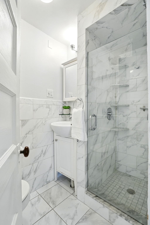 65 Eustis Street, Unit 2 Cambridge, MA 02140 - Photo 8 of 11 a bathroom with a shower