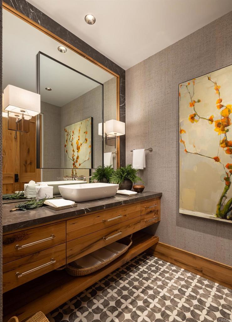 17845 Via De Fortuna Rancho Santa Fe, CA 92067 - Photo 26 of 45 a view of hall way with mirror and furniture