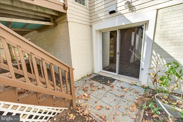 a view of entryway with stairs and wooden floor
