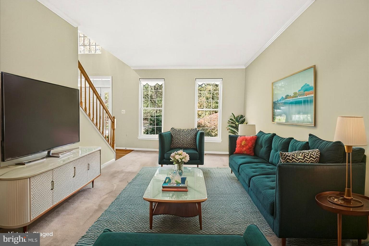 19332 Cissel Manor Drive Poolesville, MD 20837 - Photo 22 of 81 a living room with furniture and a flat screen tv