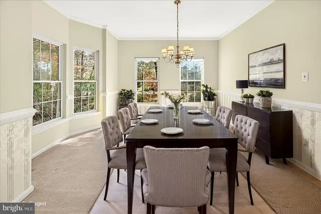 a view of a livingroom with furniture and wooden floor