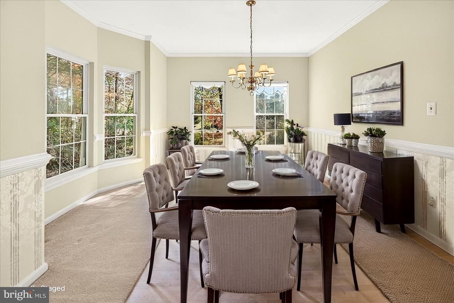 19332 Cissel Manor Drive Poolesville, MD 20837 - Photo 24 of 81 a view of a dining room with furniture window and outside view