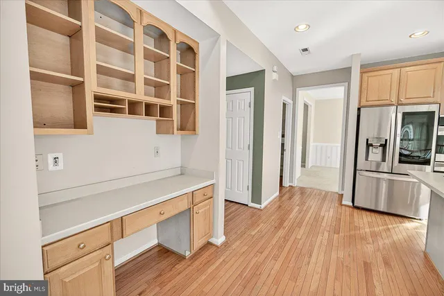 a spacious bathroom with a double vanity sink mirror and