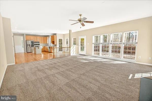 a bedroom with bed and a window