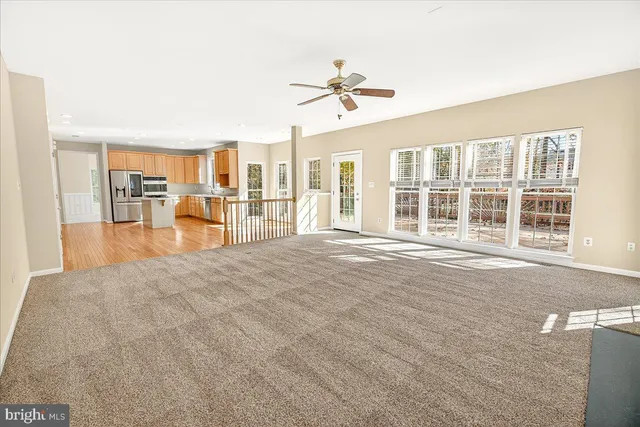 a bedroom with bed and a window