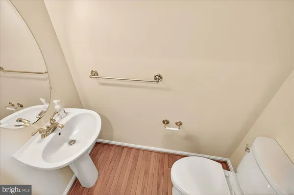 a view of empty room with wooden walls