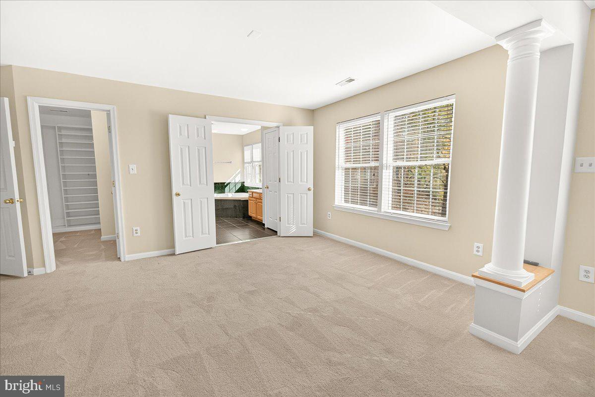 19332 Cissel Manor Drive Poolesville, MD 20837 - Photo 45 of 81 an empty room with windows