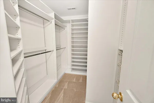 a sign that is on a brick wall