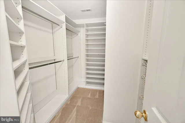 a sign that is on a brick wall