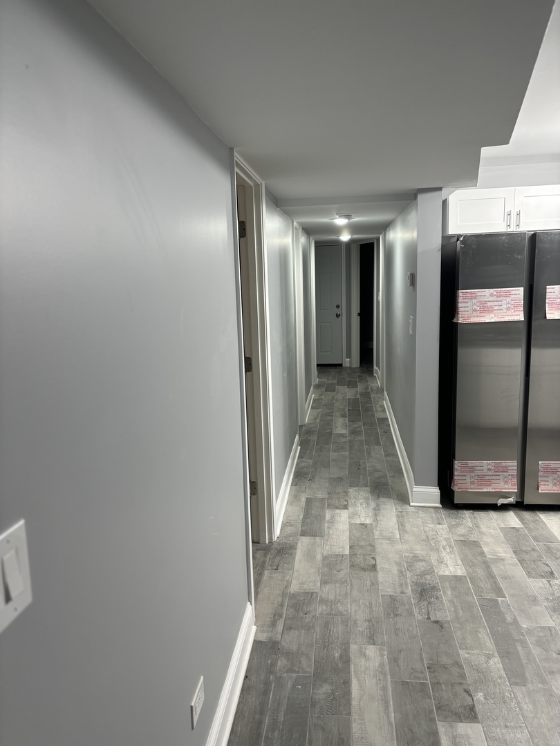 1611 South Trumbull Avenue, Unit G Chicago, IL 60623 - Photo 4 of 9 a view of a hallway