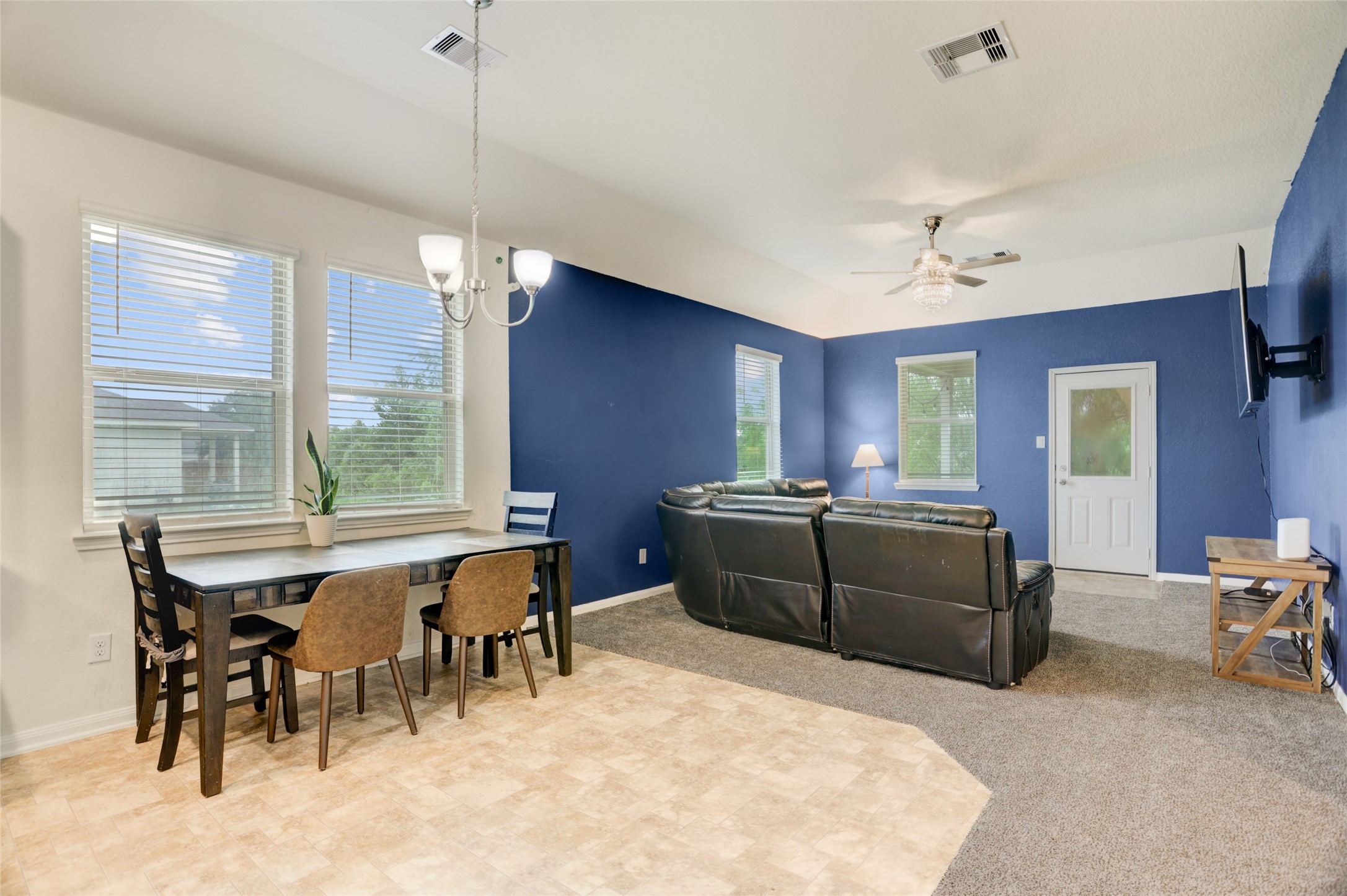 6535 Blimp Base Road Hitchcock, TX 77563 - Photo 12 of 36 The eat-in area of the kitchen and living area have lovely windows to let in tons of natural light. Add high ceilings and you'll enjoy the openness of this space.