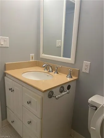 a bathroom with a sink and a toilet