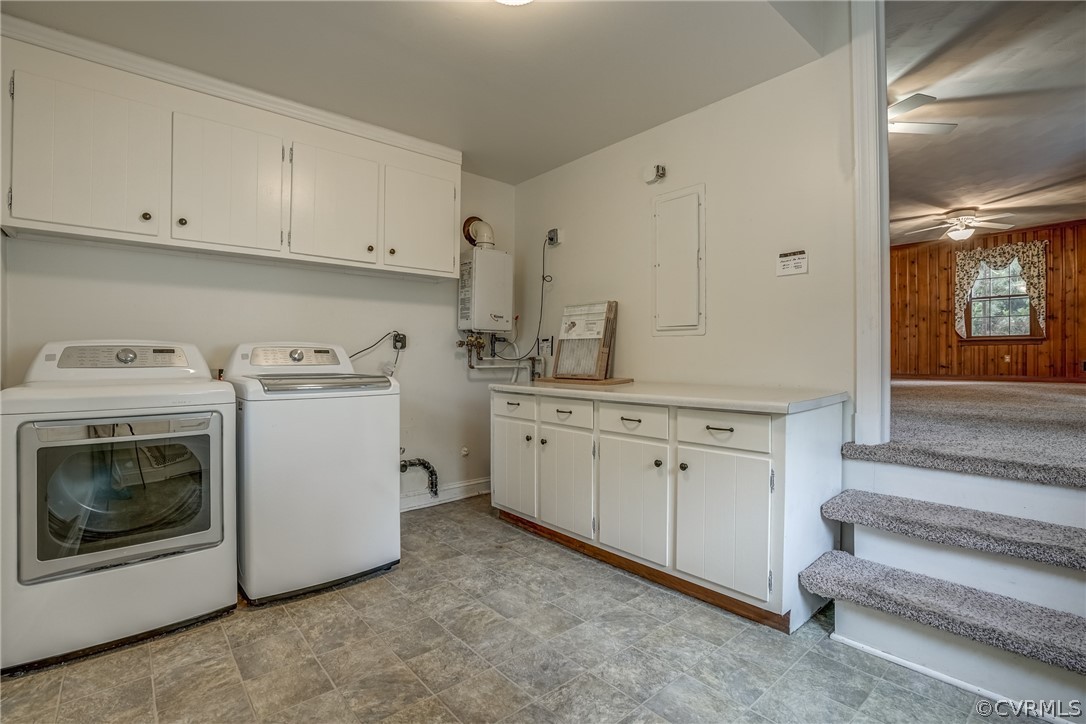 4051 Falstone Road Richmond, VA 23234 - Photo 11 of 50 a utility room with cabinets washer and dryer