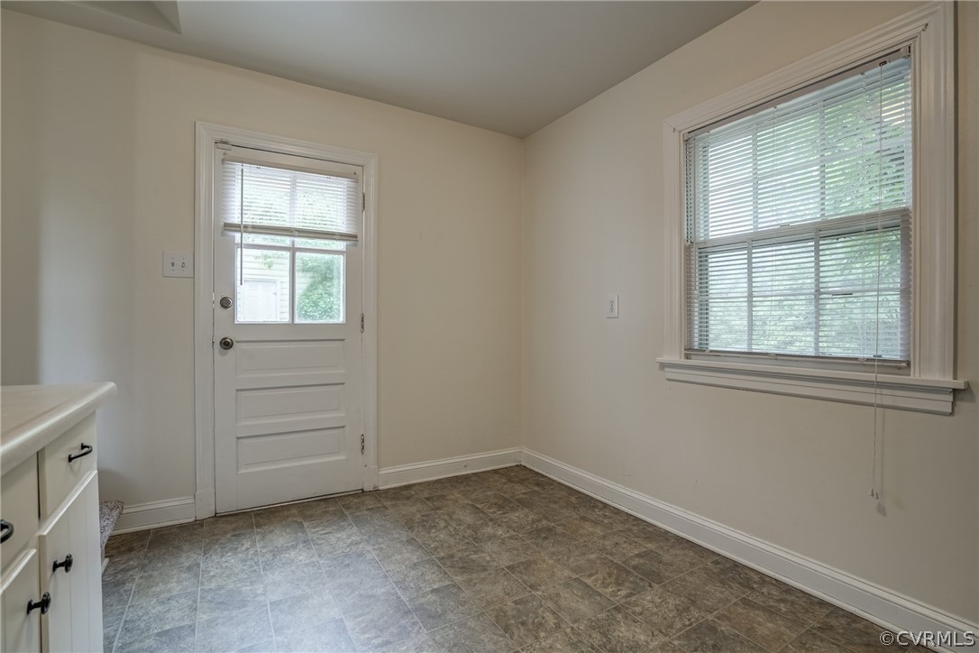 4051 Falstone Road Richmond, VA 23234 - Photo 13 of 50 an empty room with windows