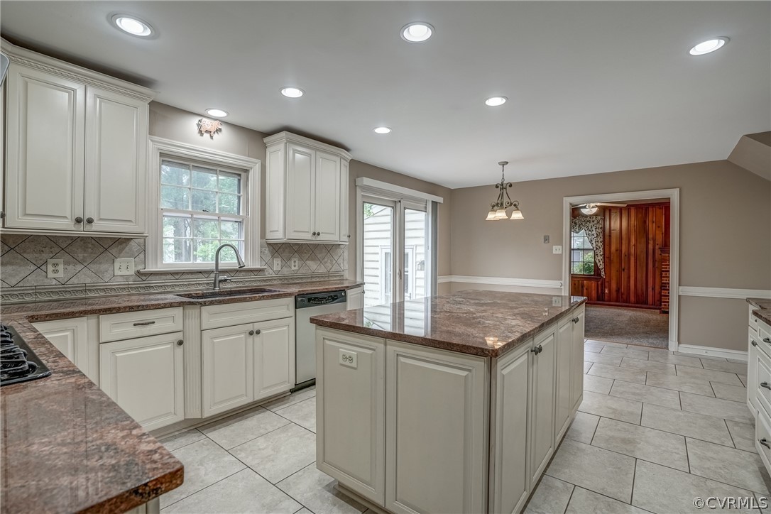 4051 Falstone Road Richmond, VA 23234 - Photo 20 of 50 a kitchen with granite countertop a sink and cabinets