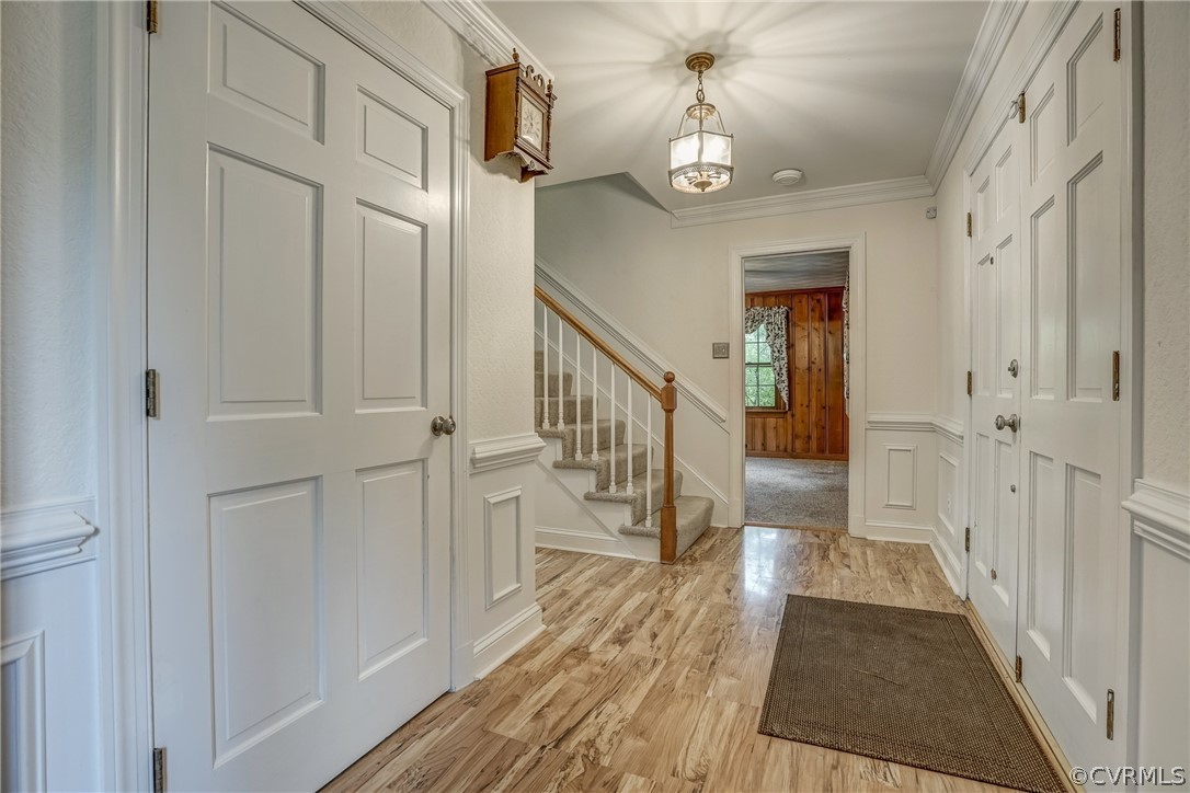 4051 Falstone Road Richmond, VA 23234 - Photo 3 of 50 a view of a hallway with a wooden floor