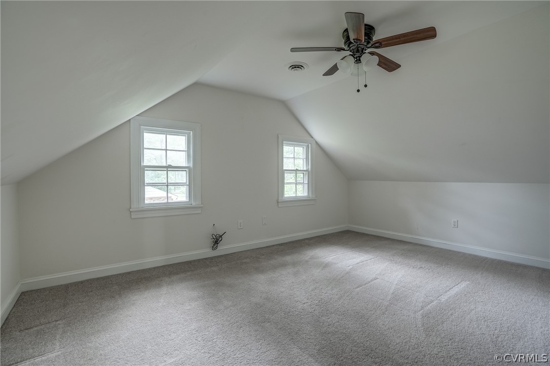 4051 Falstone Road Richmond, VA 23234 - Photo 33 of 50 an empty room with a window and a fan
