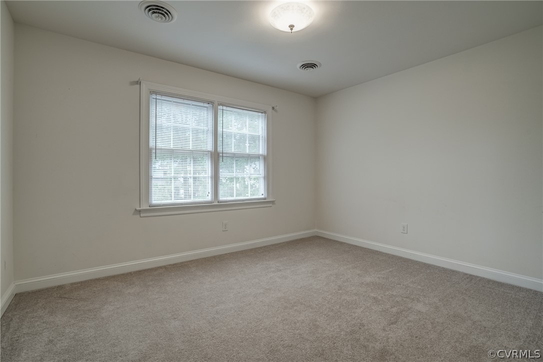 4051 Falstone Road Richmond, VA 23234 - Photo 35 of 50 an empty room with a window