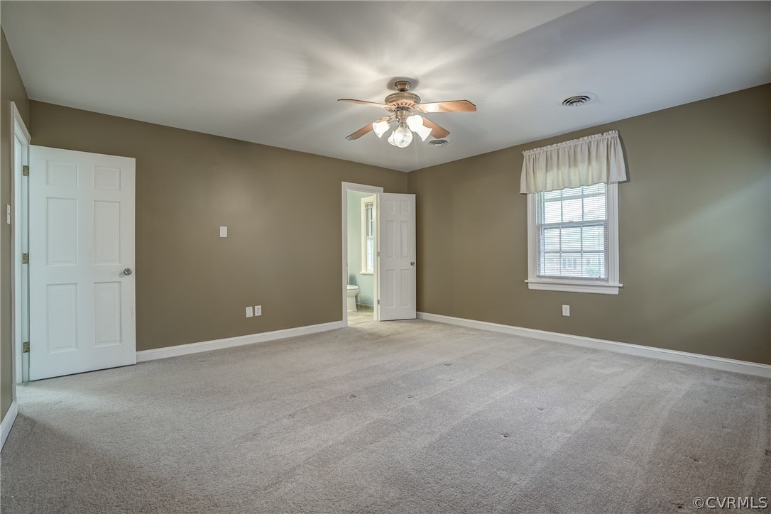 4051 Falstone Road Richmond, VA 23234 - Photo 42 of 50 a view of an empty room with a window