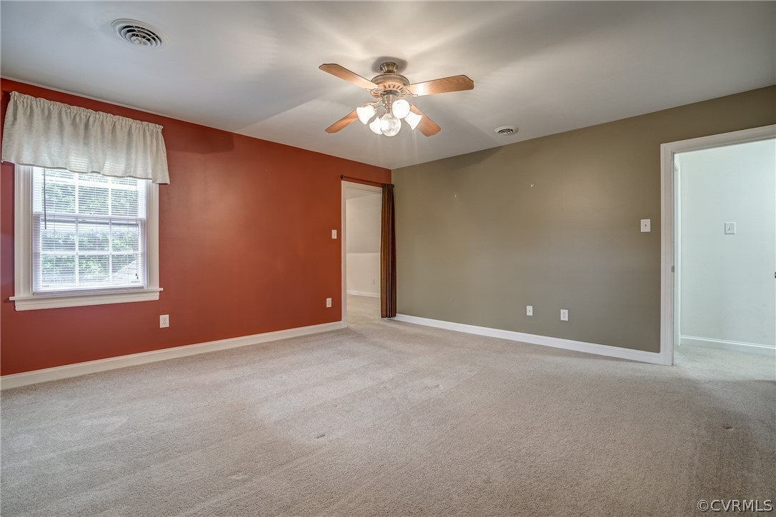 4051 Falstone Road Richmond, VA 23234 - Photo 44 of 50 a view of an empty room with a window